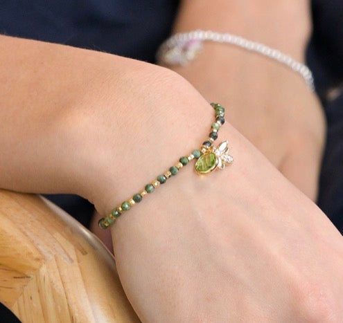 Green and golden bee charm bracelet