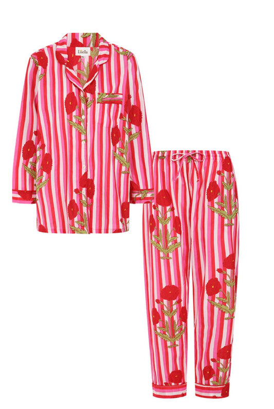 Pink and red striped pajama set with floral patterns on a white background