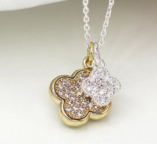 Faux gold and silver plated double quatrefoil necklace with crystals