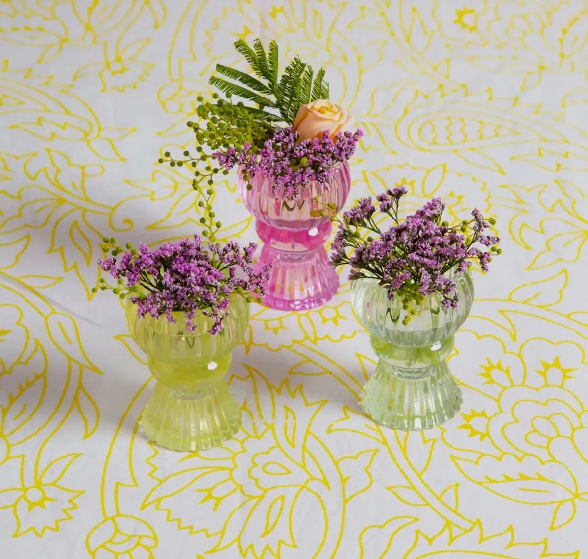 Small light green glass candle holder